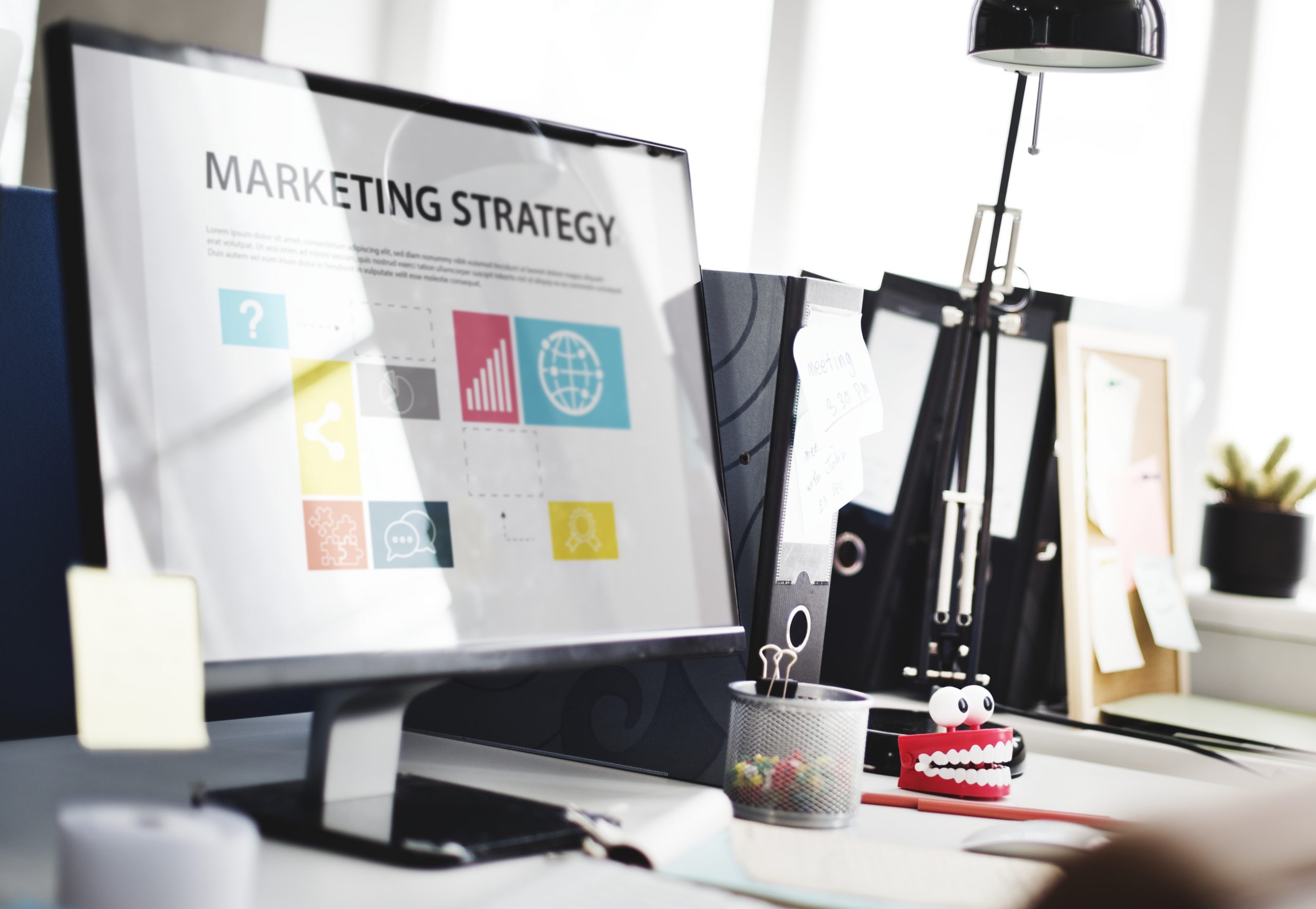 Computer screen showing marketing strategy planning – SMS Marketing Malaysia for business growth