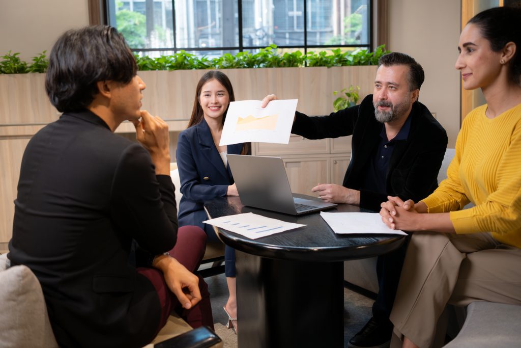 Team discussing how a Message API can enhance customer communication strategy