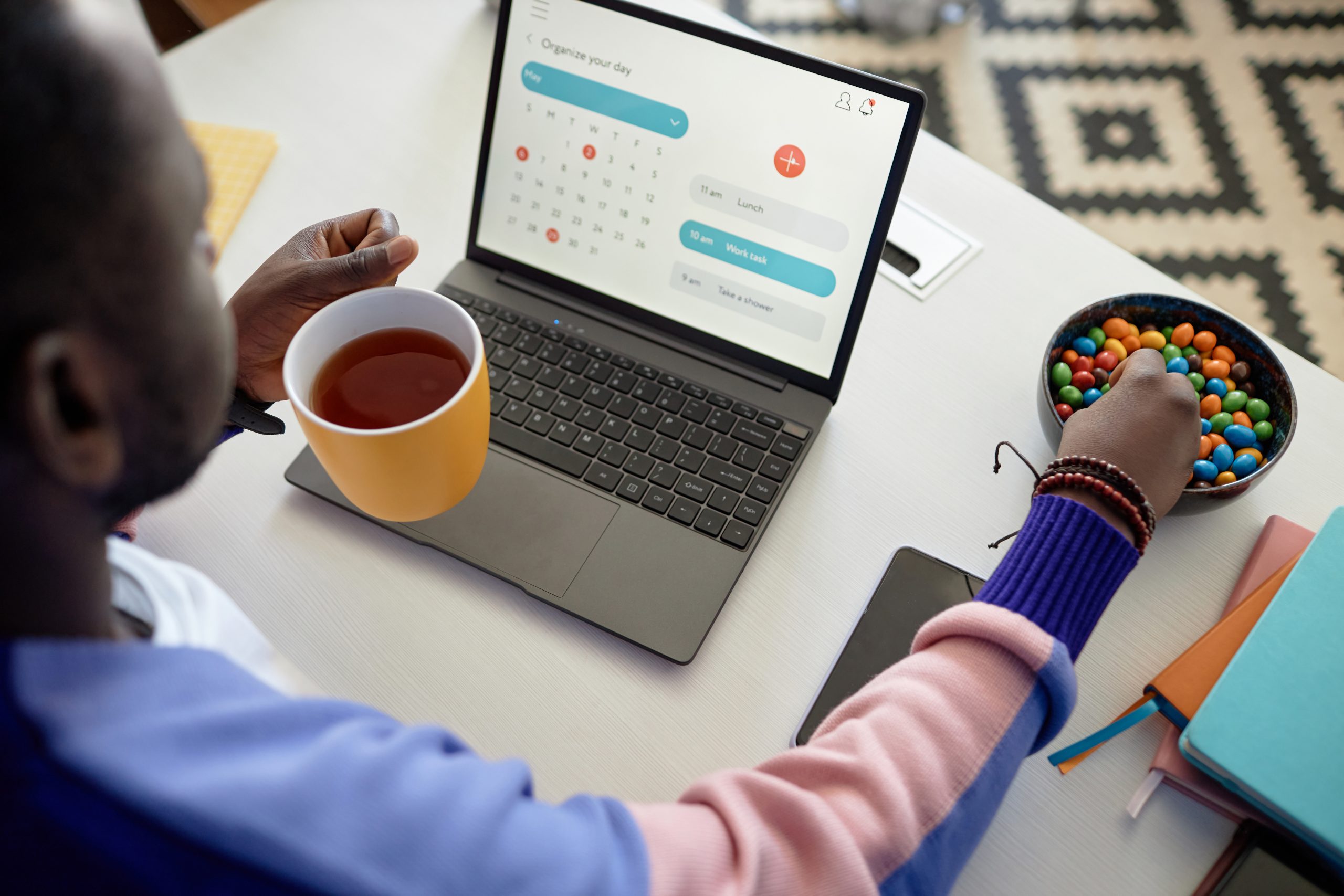 Managing automated marketing campaigns on a phone and laptop with an SMS provider Malaysia.
