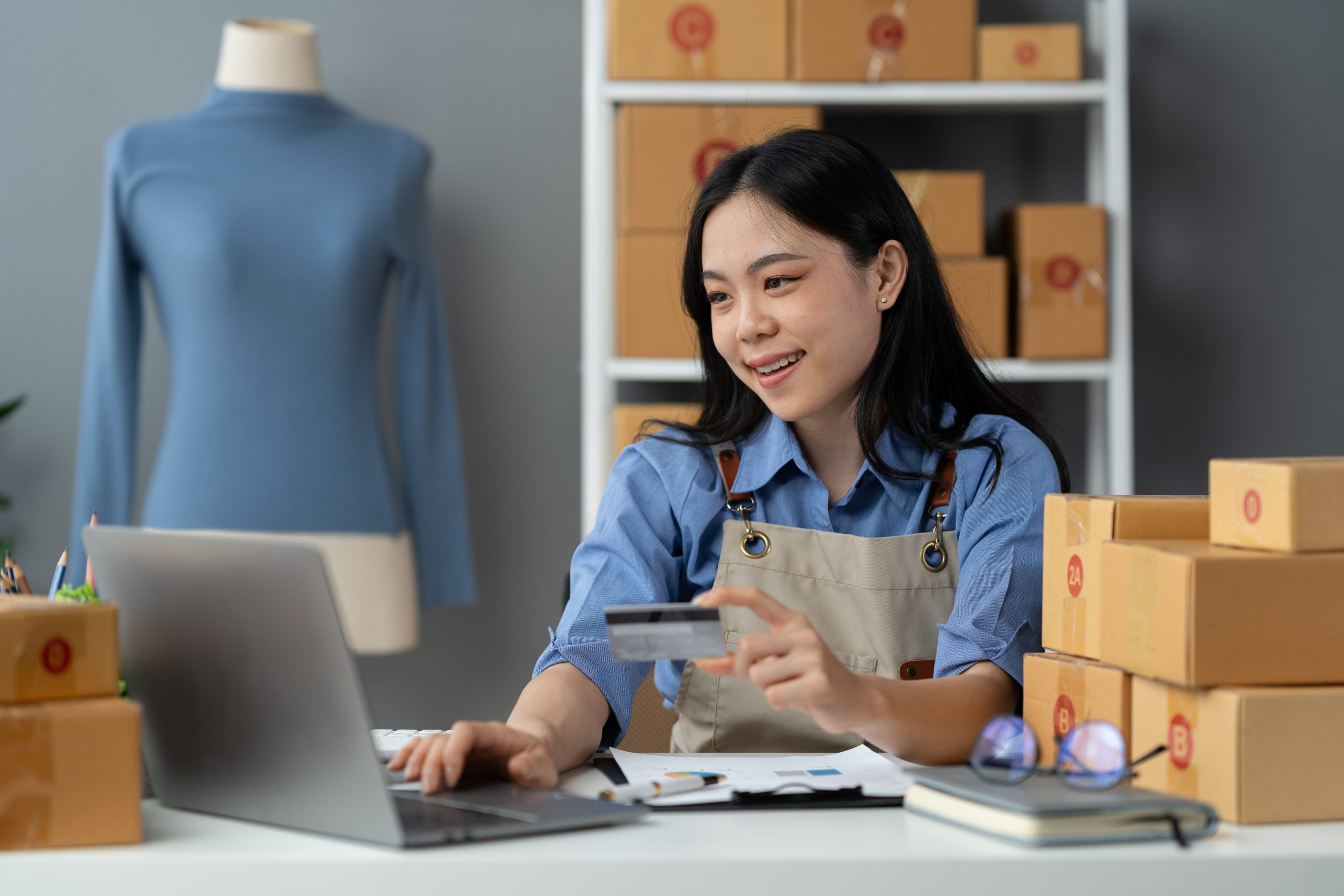 E-commerce business owner managing online orders and customer communication using a Programmable SMS API