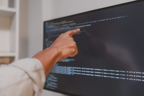 Developer reviewing code for WhatsApp API integration