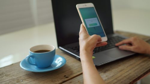 Managing automated marketing campaigns on a phone and laptop with an SMS provider Malaysia.